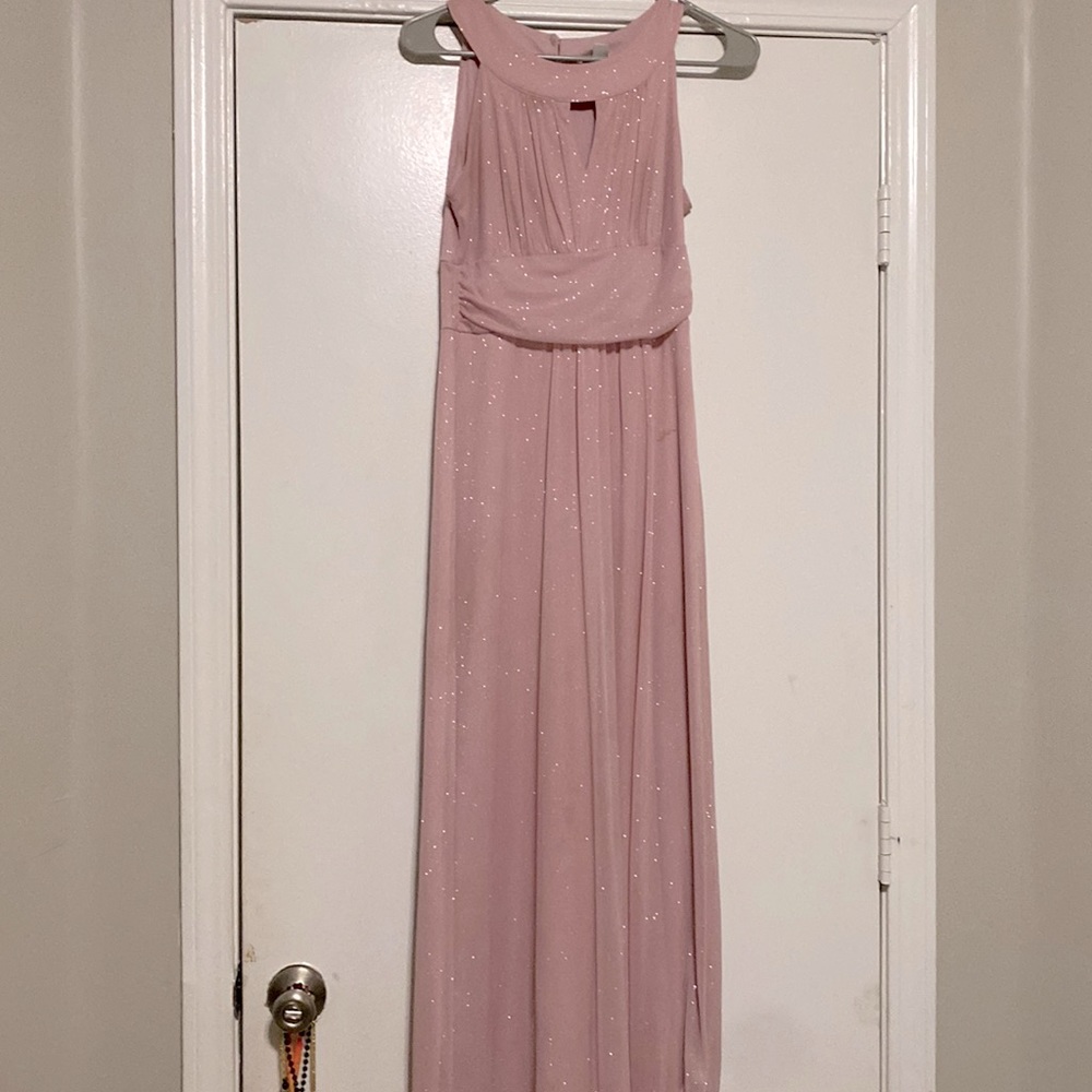 In perfect condition, great for formals or dances. And it is sparkling.